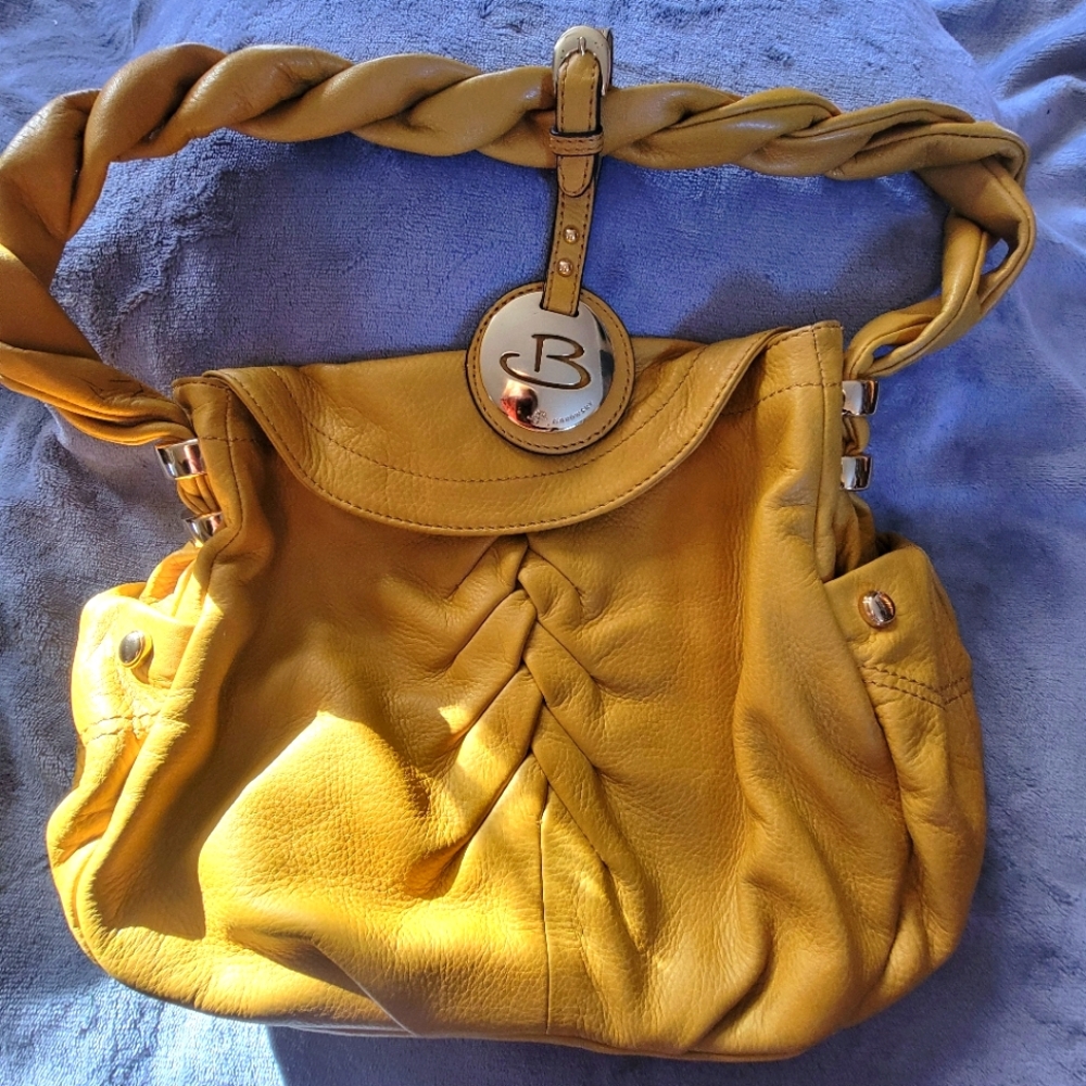 B. Makowsky Yellow Handbag